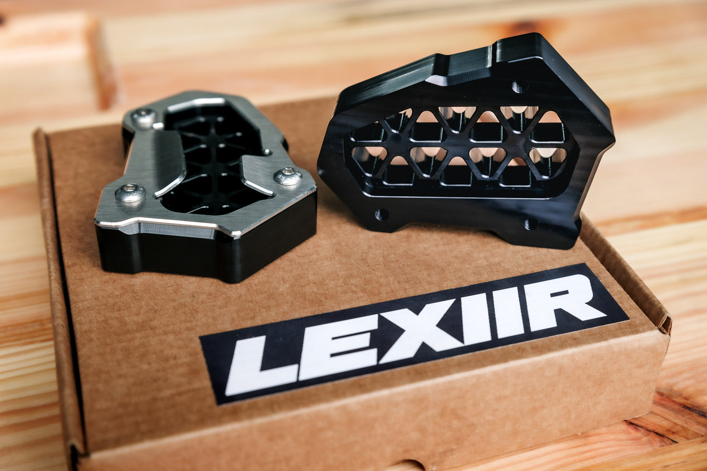 CNC machined aluminum motorcycle side stand riser for BMW R1300GS, increases kickstand footprint for gravel and soft ground parking, adventure bike accessory.